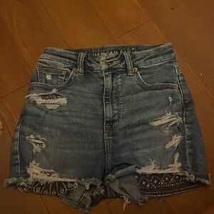 i am selling blue denim American eagle shorts